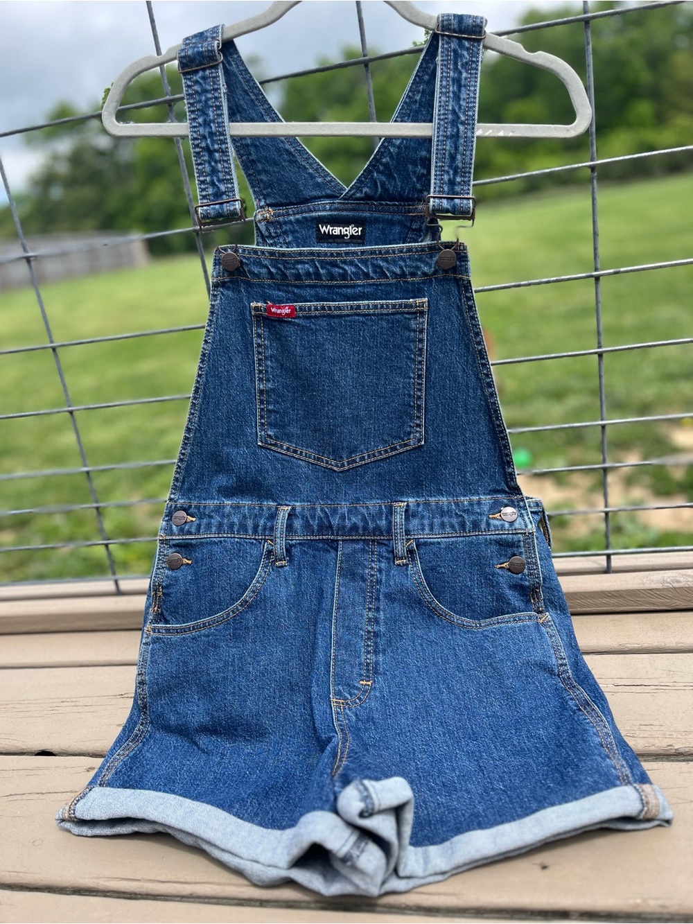 Women’s Wrangler Denim Shortalls in Blue with rolled cuff hem